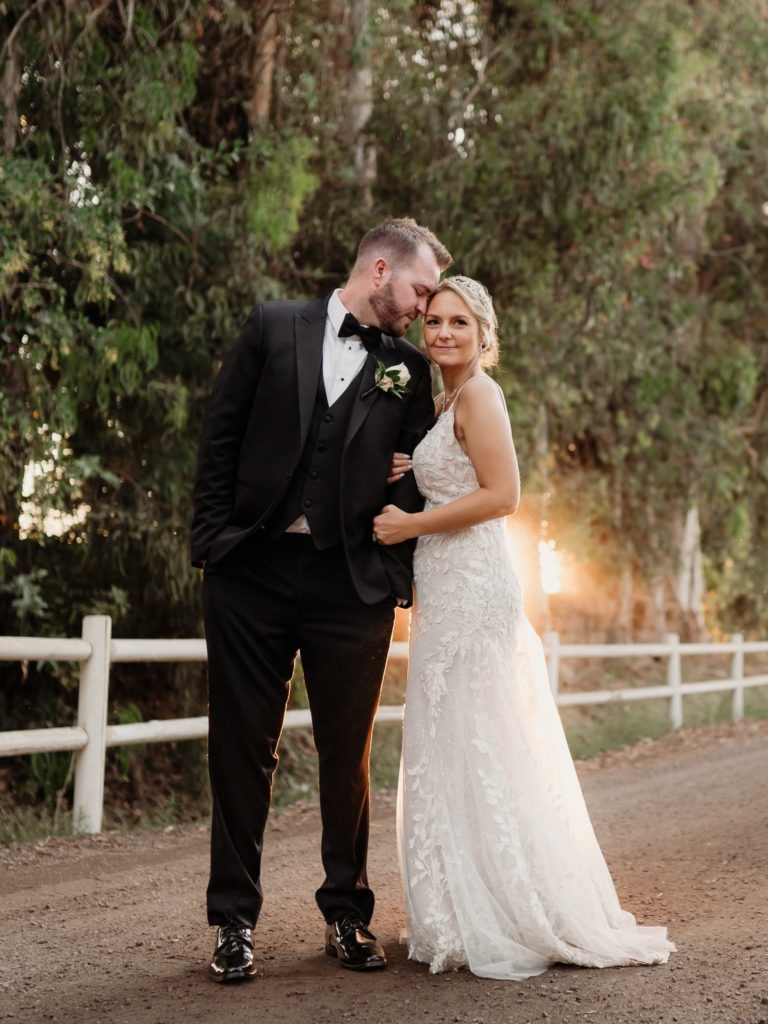 top 3 tips when planning your wedding, bride and groom romantics during golden hour at walnut grove in moorpark,ca