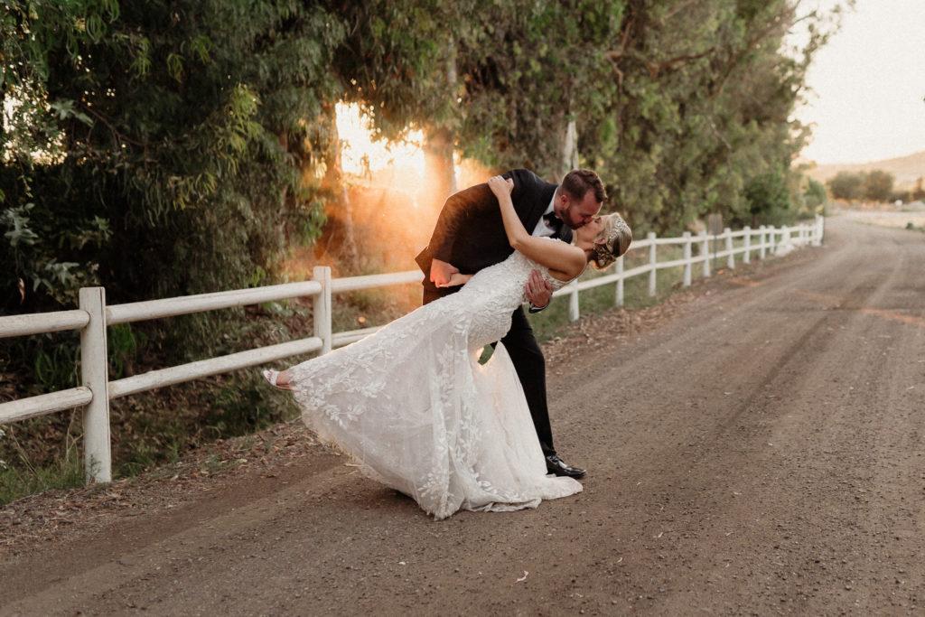 top 3 tips when planning your wedding, bride and groom romantics during golden hour at walnut grove in moorpark, ca