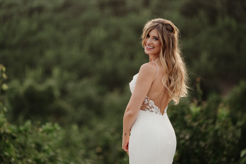 bride in her wedding dress at quail ranch